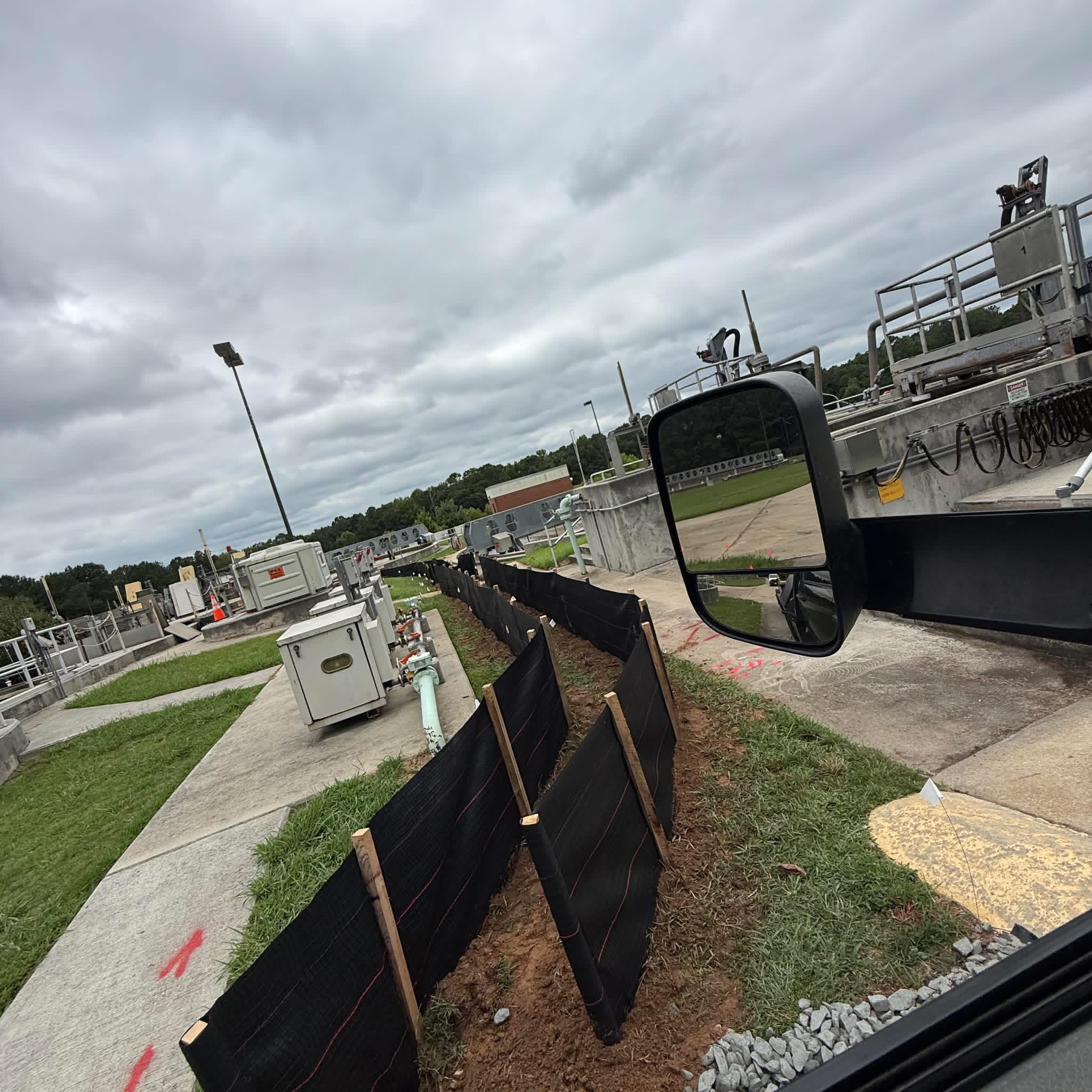 Silt fence installation at a municipal wastewater treatment facility in Georgia